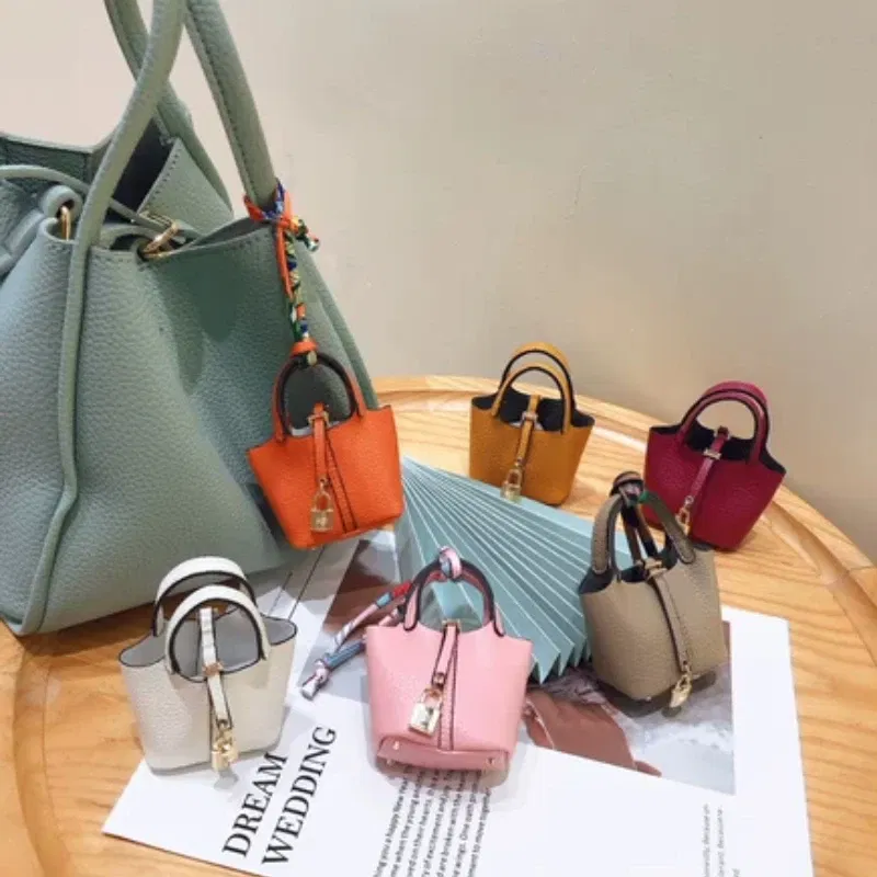 Color: Blue - Mini Bag Pendant Keychain Hanging Accessory Zero Wallet Creative Portable Bracelet Bluetooth Earphone Bag Multifunctional