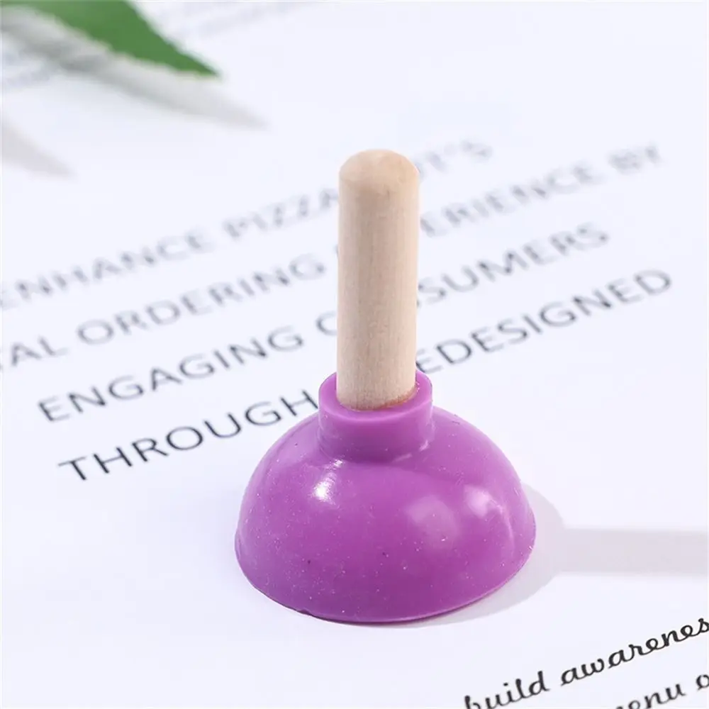 Color: Sapphire - Mini Colorful Toilet Shape Plunger Phone Holder Sucker Stand Tiny Plunger Magic Tricks Inspired Looking For Card Professional
