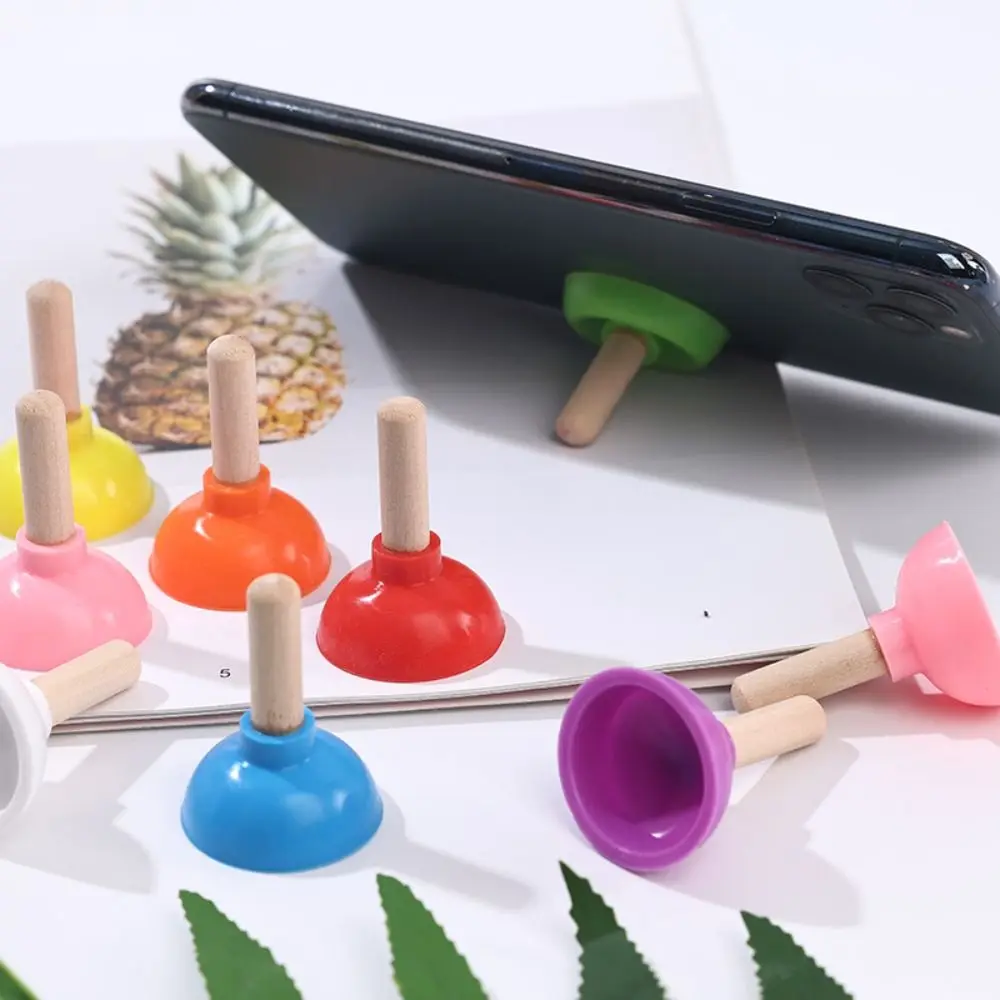Color: black - Mini Colorful Toilet Shape Plunger Phone Holder Sucker Stand Tiny Plunger Magic Tricks Inspired Looking For Card Professional